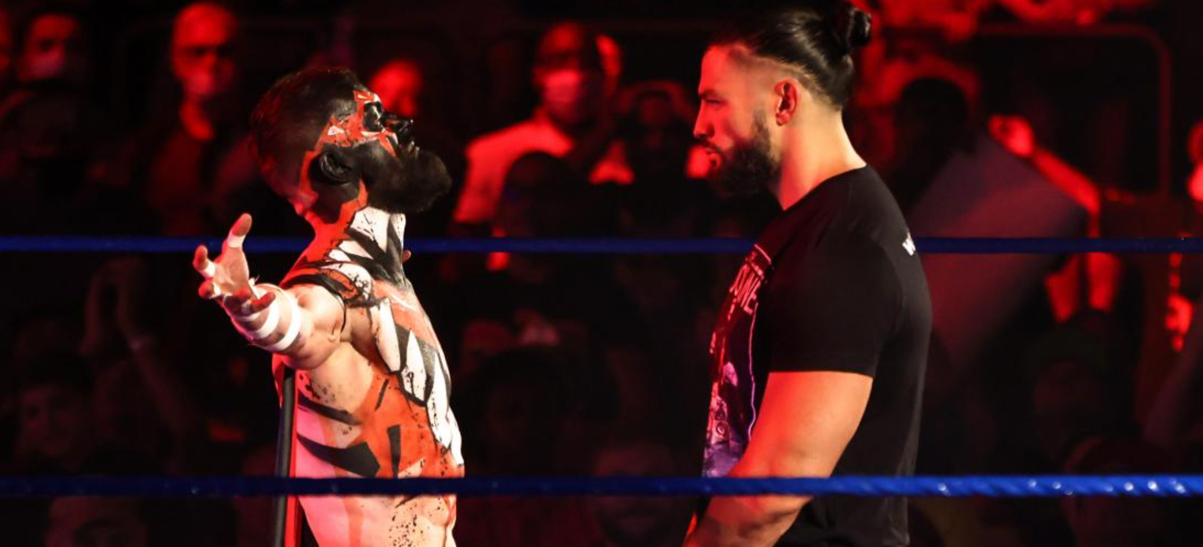 The Demon Finn Bálor confronts Roman Reigns.